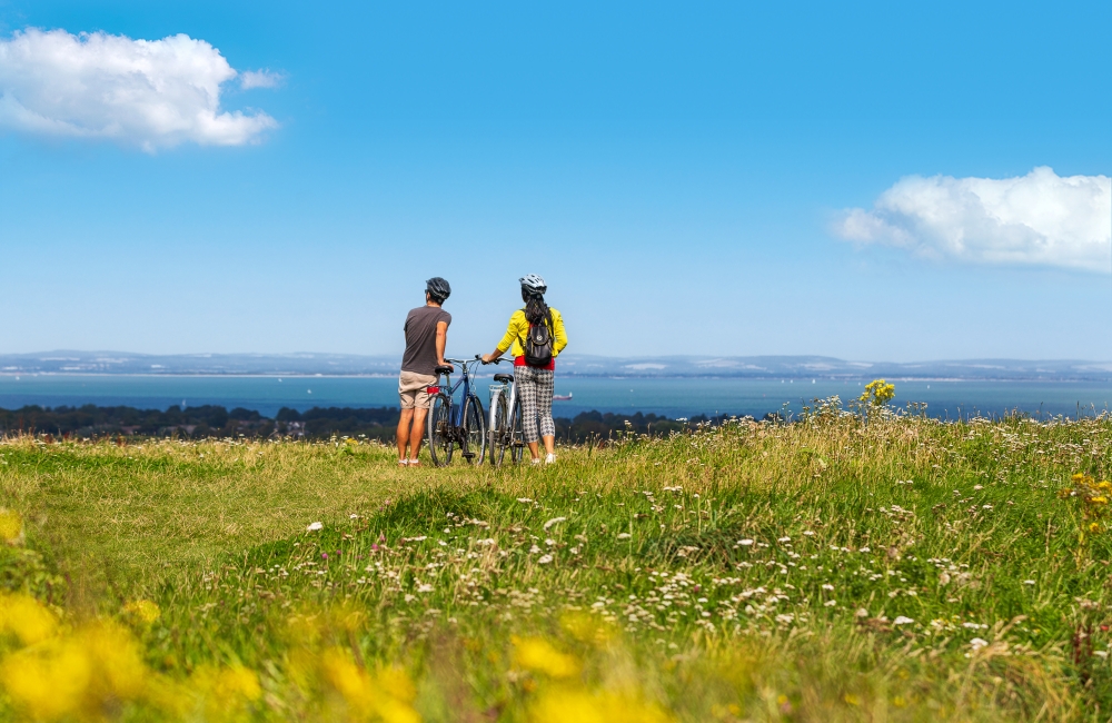 Couple looking out to sea on Culver Down