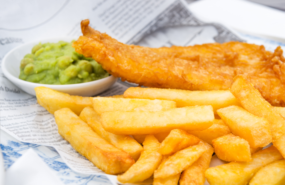 battered fish and chips with mushy peas