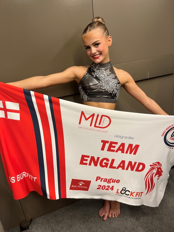 Jess Burfitt with team flag