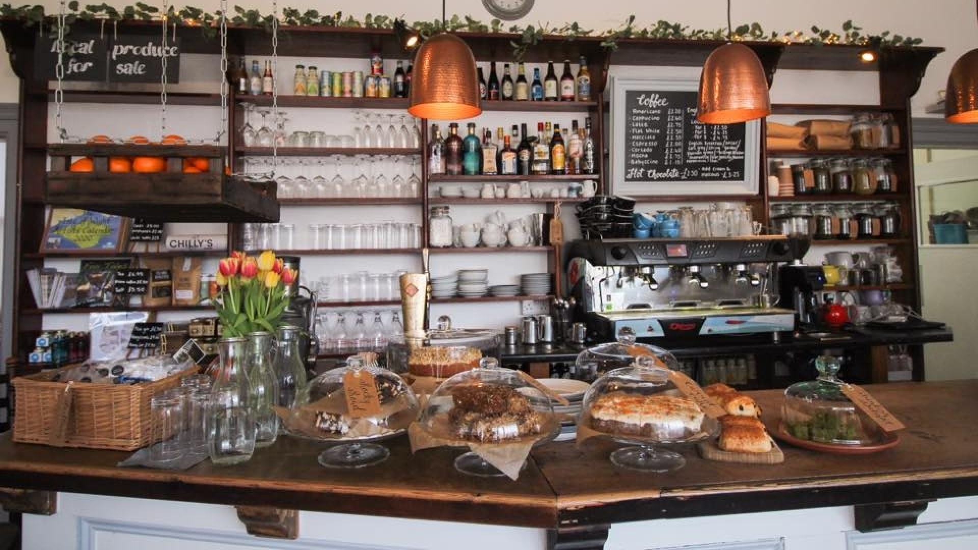 piano cafe counter with selection of homemade cakes