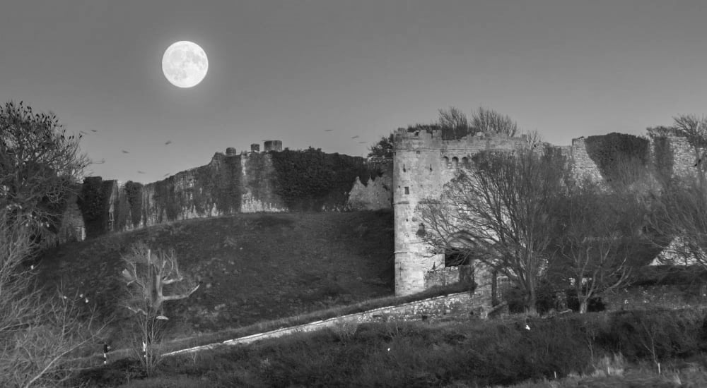 full moon over carisbrooke castle